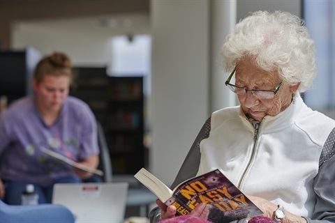 Two women reading books