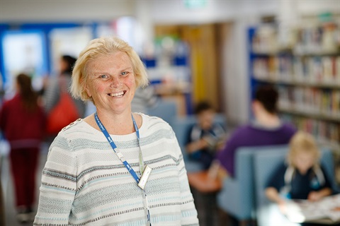 Staff member in library